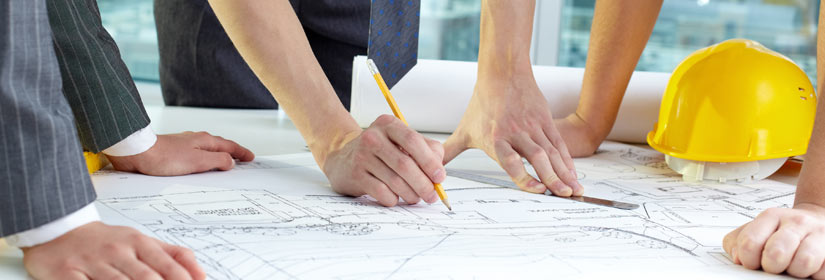People looking over plans
